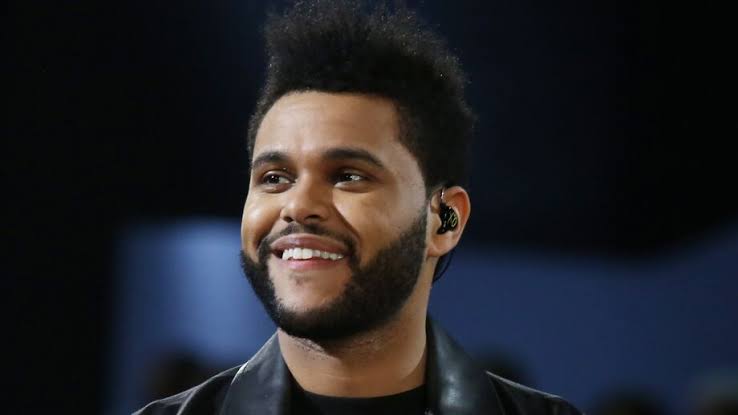 The Weeknd And His Dark Melancholy Story 8 Star boy smiling with short hair