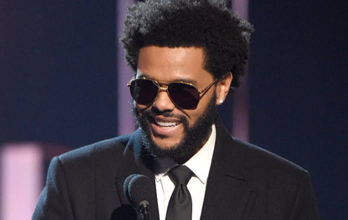 The Weeknd And His Dark Melancholy Story 7 The Weeknd in trench coat