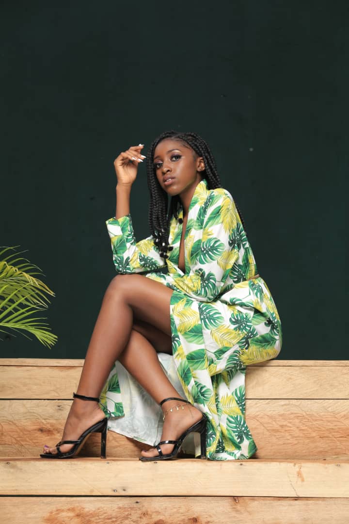 Nansamba Maria in green
