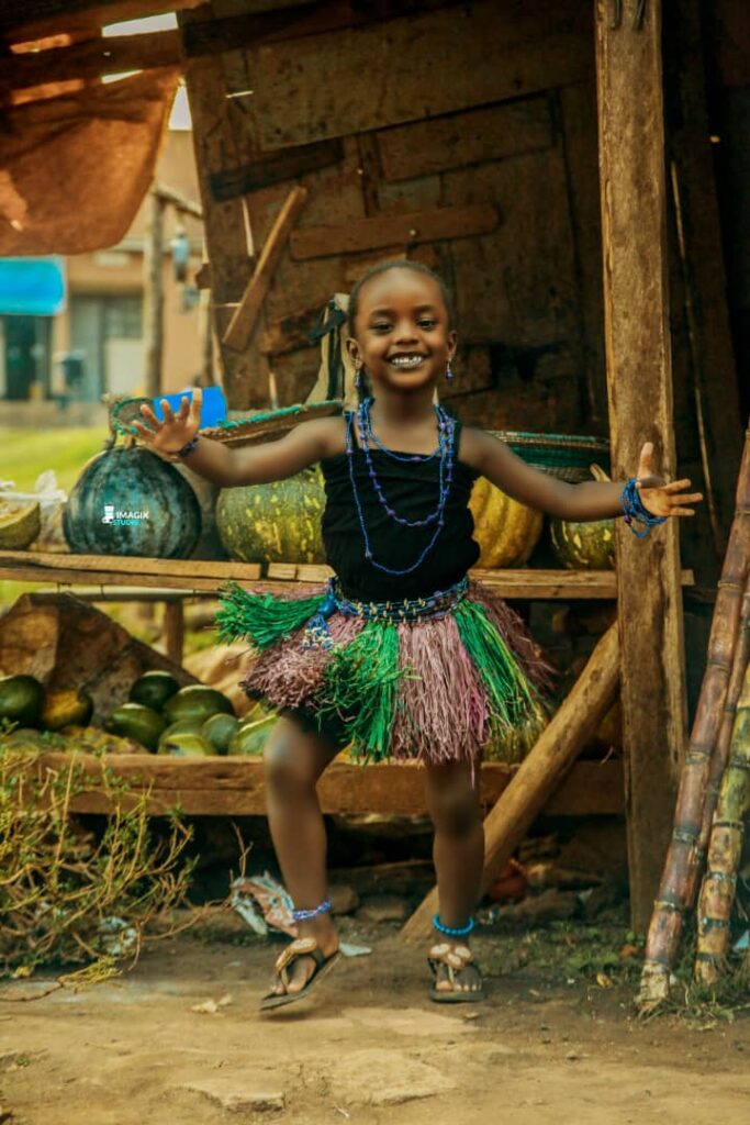 Tashan Brianah little black gitl in traditional vegetable market