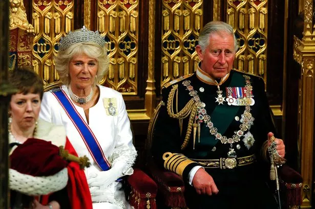 King Charles Coronation with queen consort in white