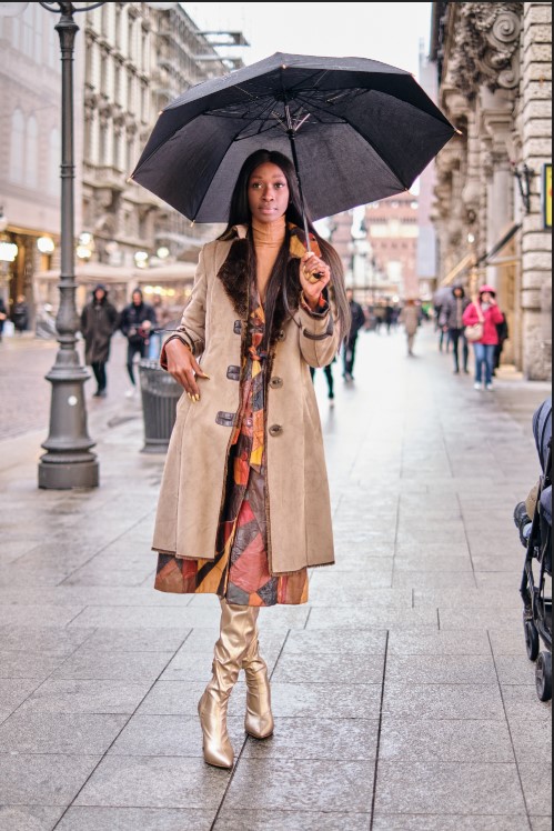 black elegant woman in trench coat