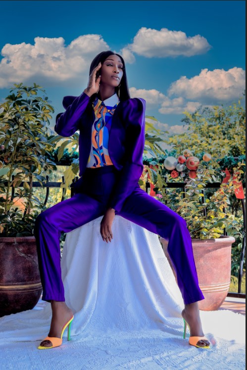 stunning black ugandan model in blue office wear