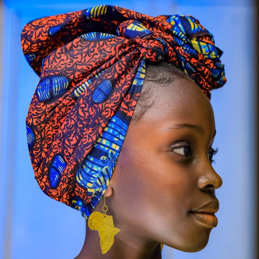 Mugasa Myra | Unravelling The Dazzling Ugandan Kid Model 14 beautiful black african girl wearing kitengi head cloth