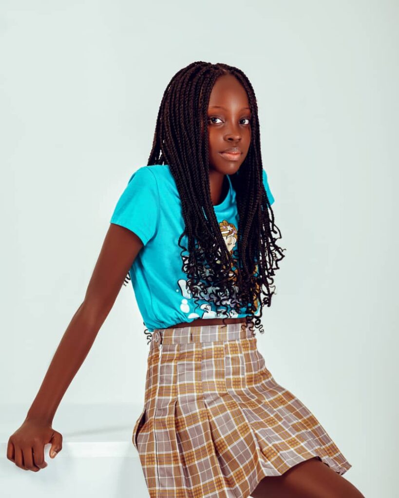 Mugasa Myra | Unravelling The Dazzling Ugandan Kid Model 6 Mugasa Myra in blue