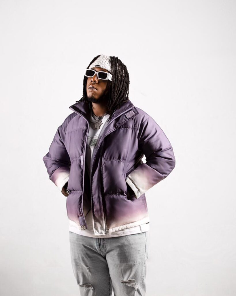 pocketing in purple jacket while facing up