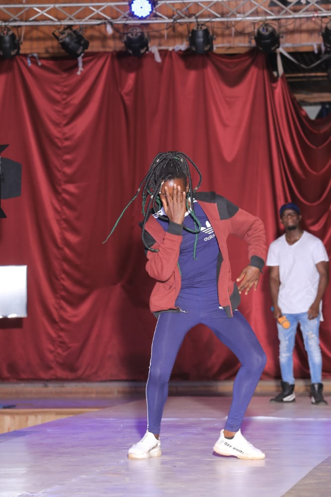 ugandan girl dances on stage