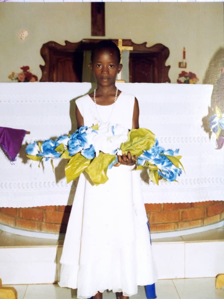 Receiving First Holly communion