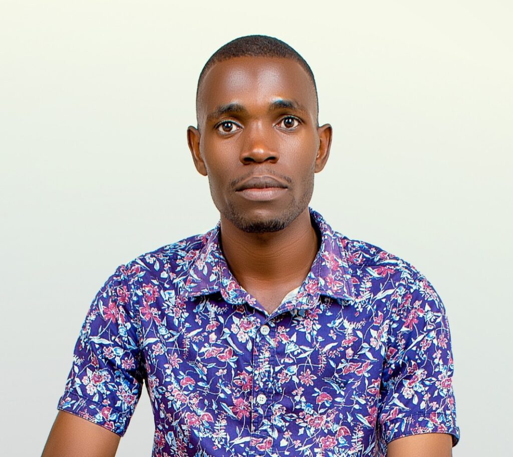 mayende collins israel the writer at kampala edge times with john kenny adeya