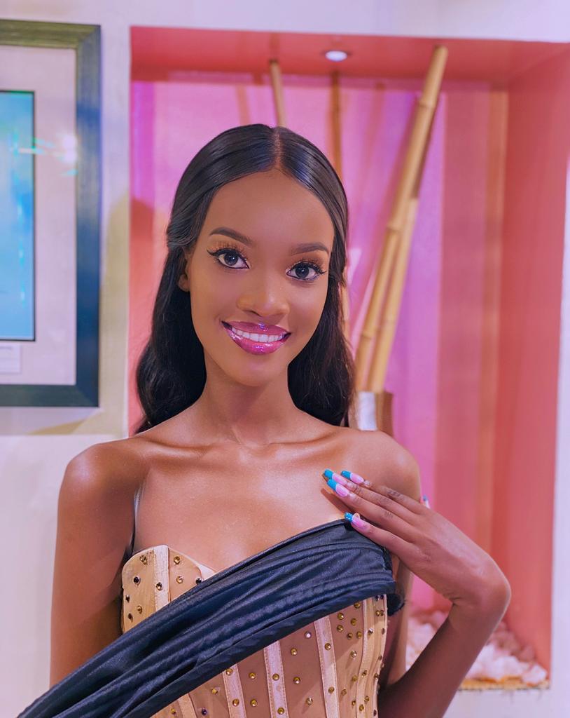 Sharon Kiyimba Promise, Winner of Top Model Uganda 2023. 7 black model dressed like a barbie doll