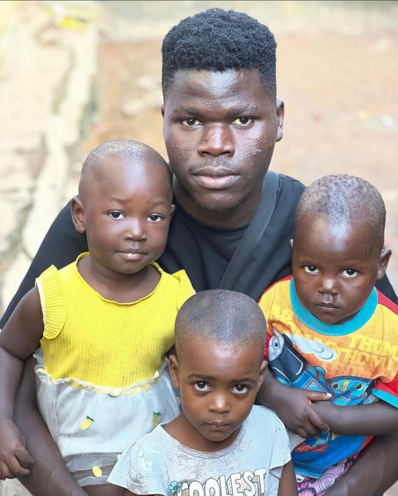 allan kato with little kids