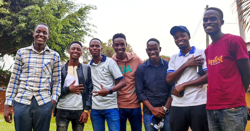 Why John Kenny Adeya Began Kampala Edge Times In 2018 3 john kenny adeya poses with Nesta, Peter and Mark fro Phanero