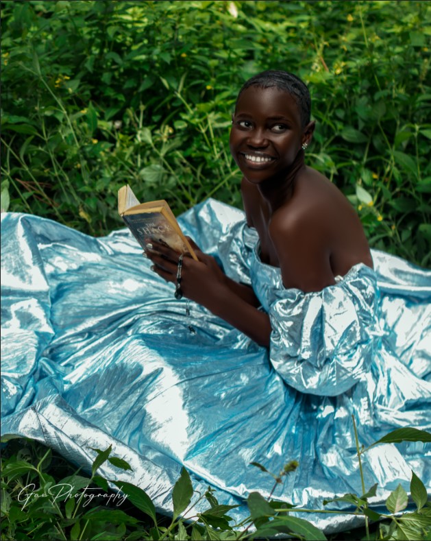 Haboya Peace, Fashion Diva Opens Up About Her Life 10 black girl in white dress reading a book