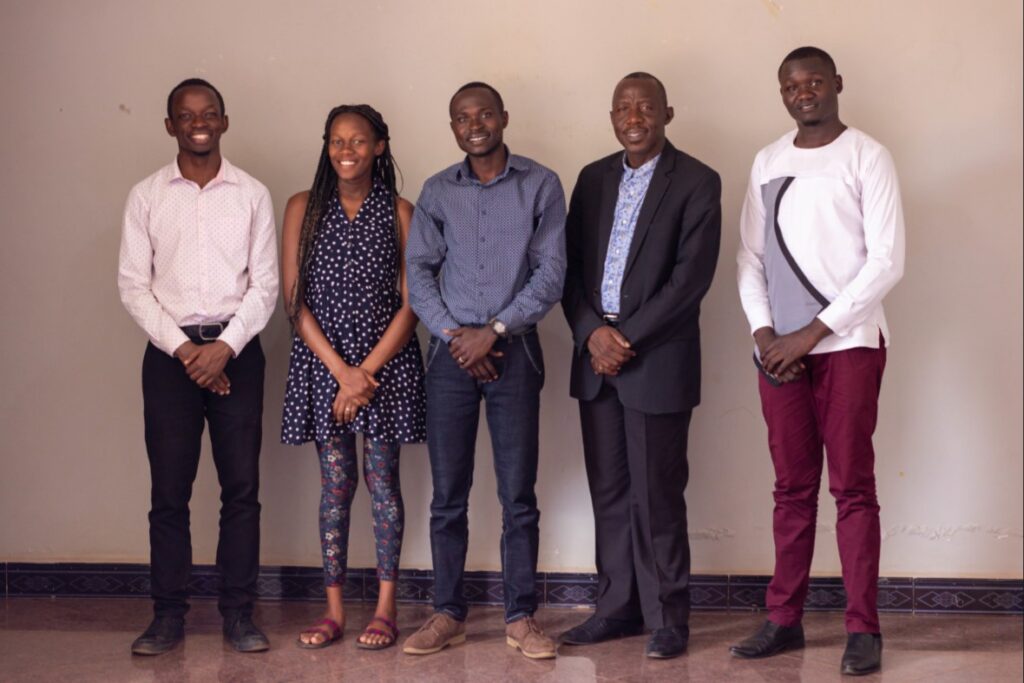 group photo with a woman in the boy child NGO