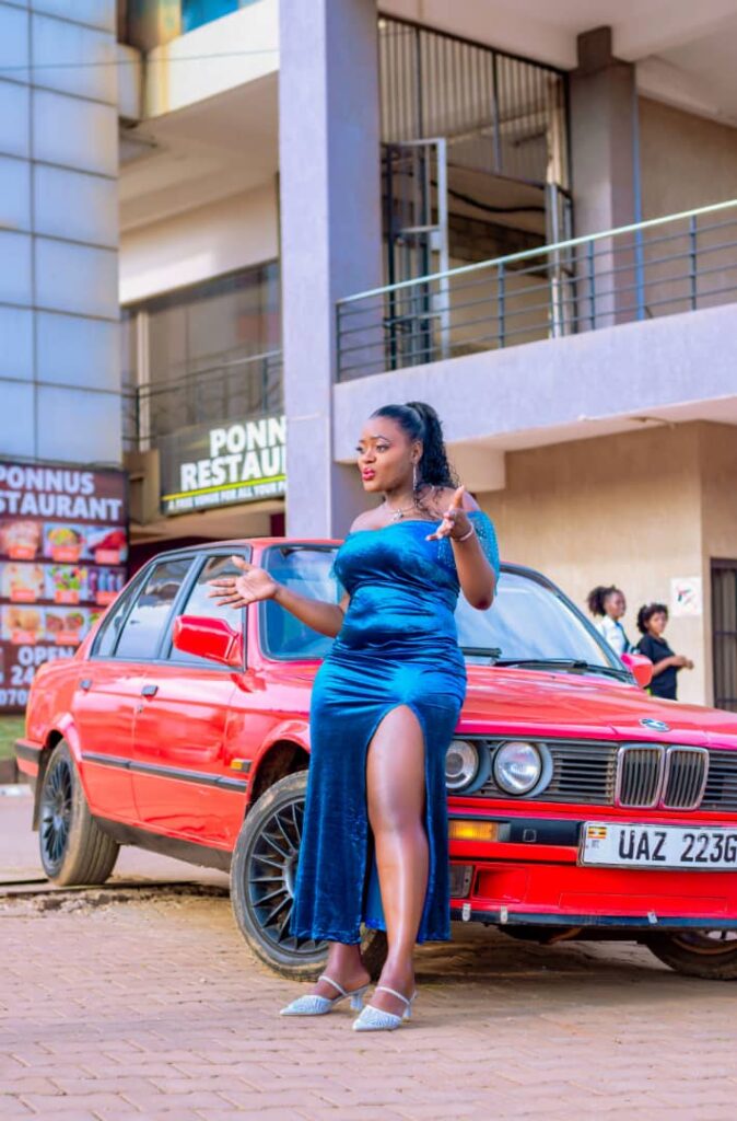 Amie Karli at the beautiful red car when shooting