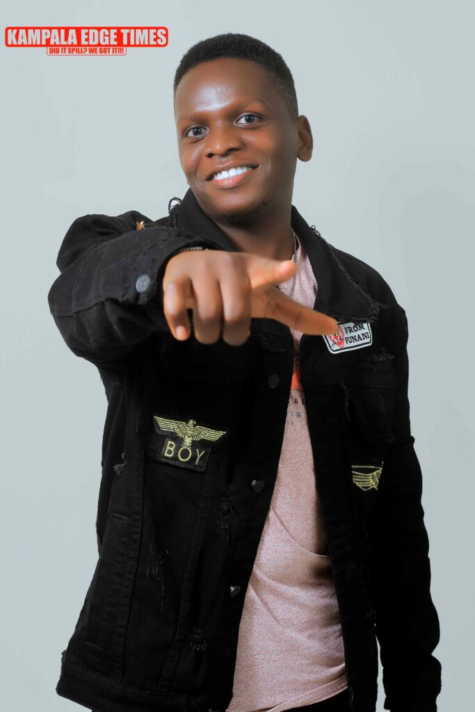 Zydecco Rapgod: Balancing Music, Education, and Youth Empowerment 1 Owili Nathan Komakech