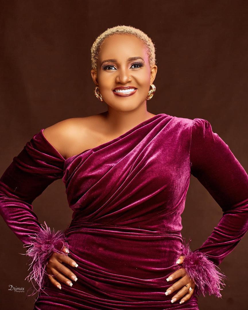 Meet Princess Sandra Elias, Maid In The Sanyu Series 20 Princess Sandra Elias dressed in a maroon dress
