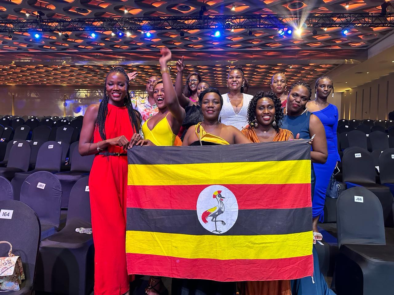 Cheering Hannah Karema with Uganda flag