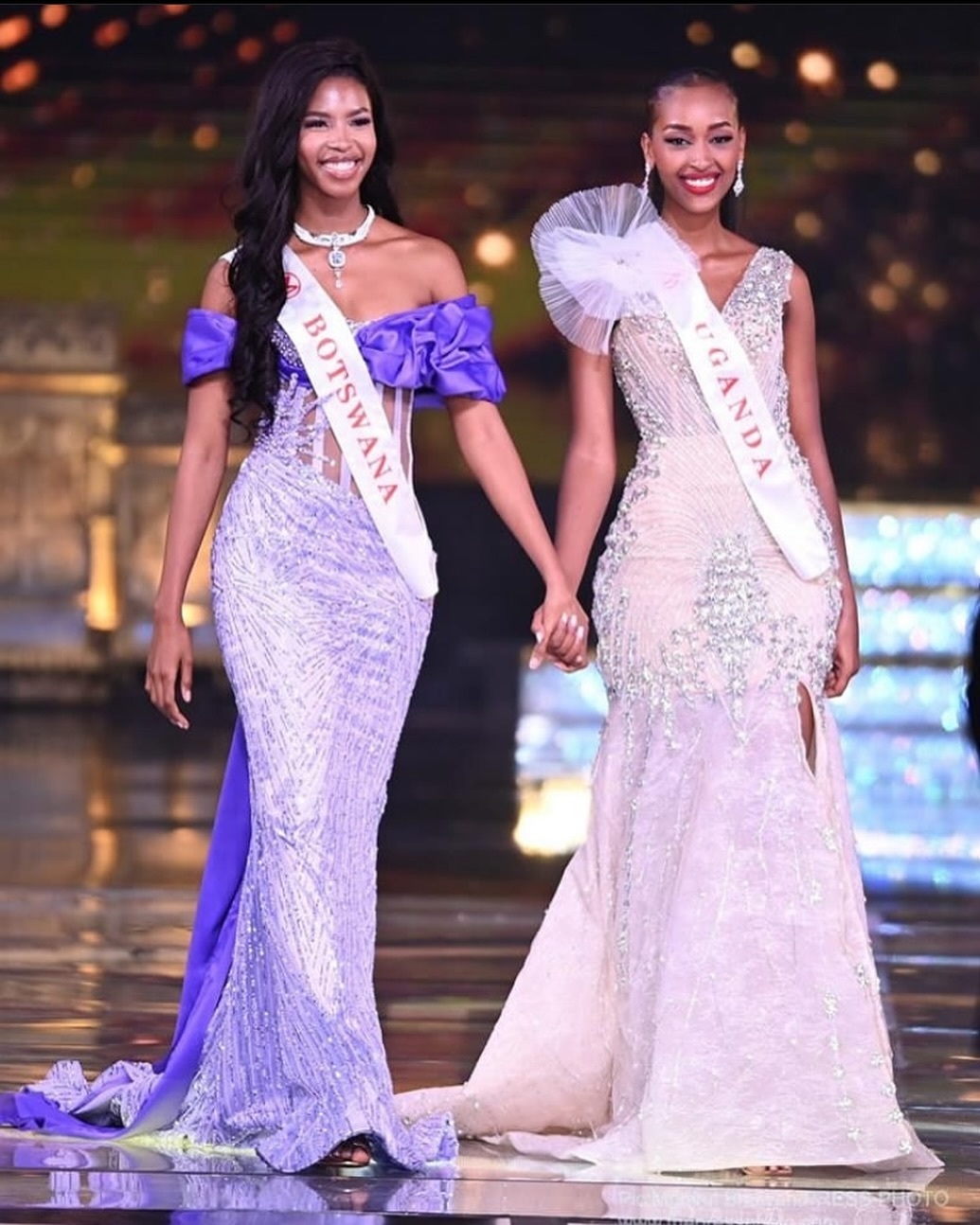 Hannah Karema holding hands with Botswana contestant