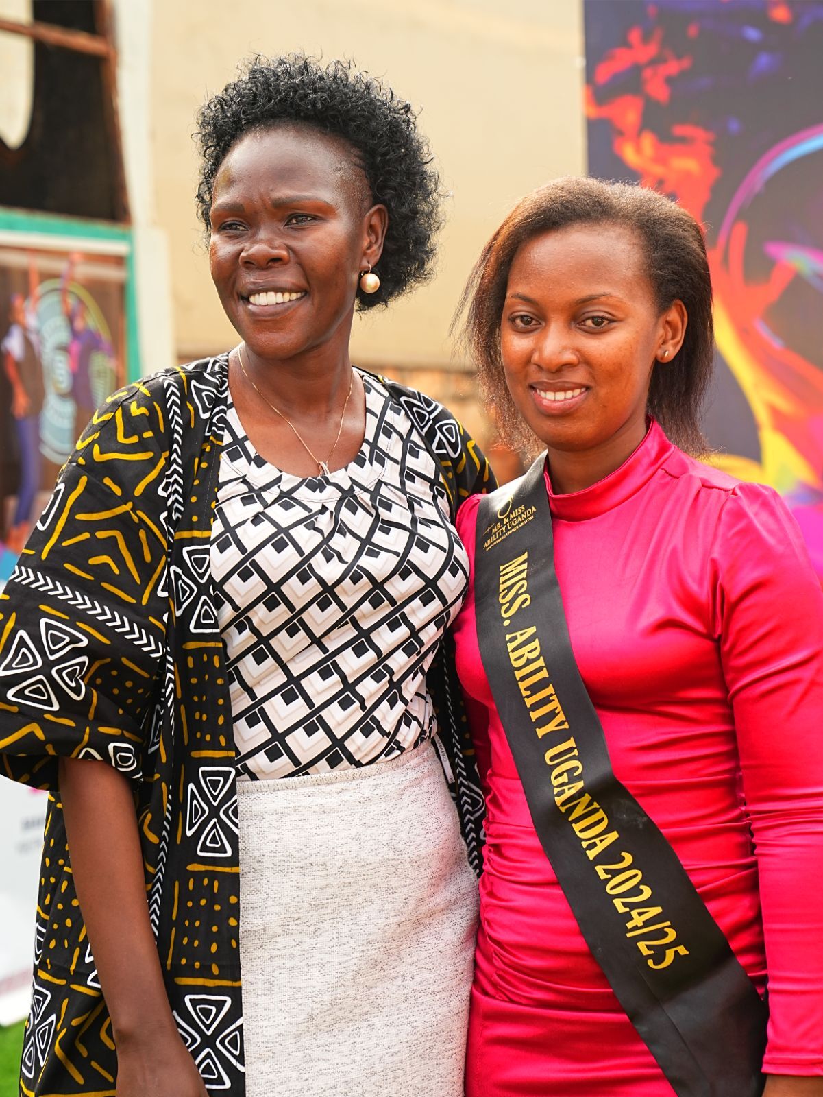 Video: Evelyn Anite steals the show at BNN Youth Summit 1 Evelyn Anite poses for a photo with Miss Ability Uganda