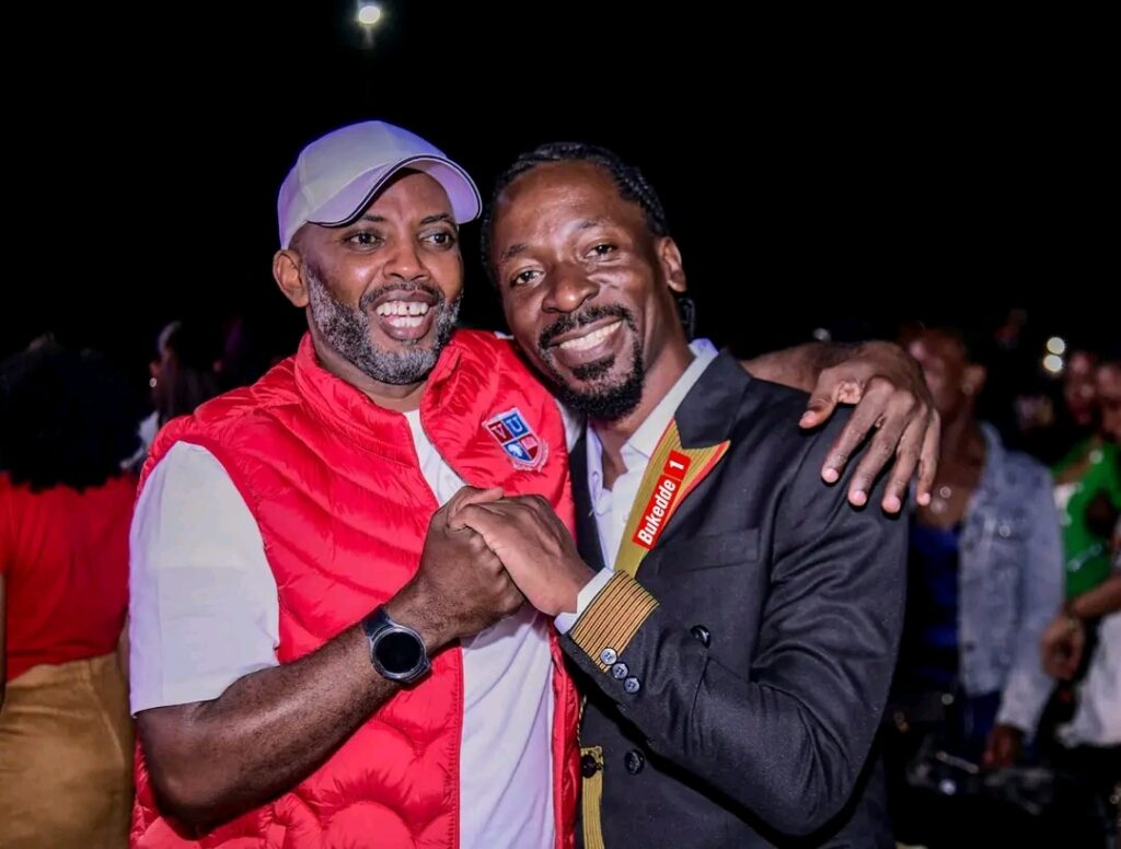 Unbelievable Scenes at Neyanziza Concert as Sheebah Unveils Her Pregnancy 10 Prof. Muganga Lawrence poses for a photo with Isaac Ssemakadde at Neyanziza Concert