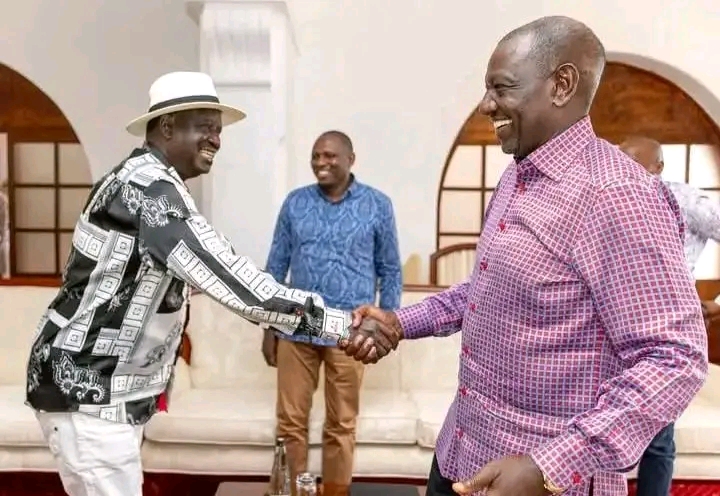 President William Ruto and Raila Odinga shaking hands
