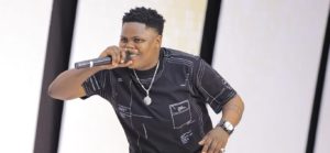 uncle chumi on stage at comedy store