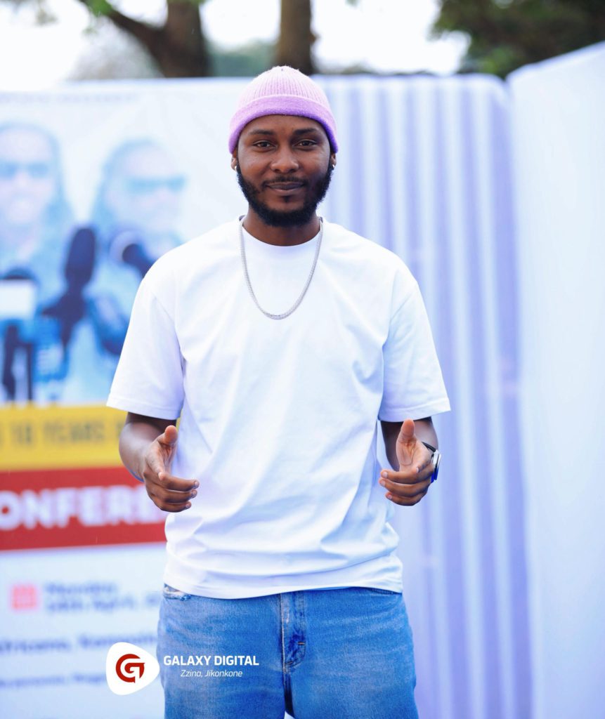 Alfa Timez poses for a picture