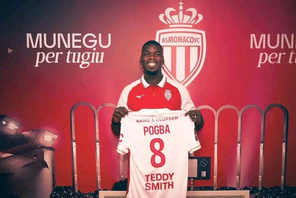 Paul Pogba holding As Monaco shirt, he will wear number 8