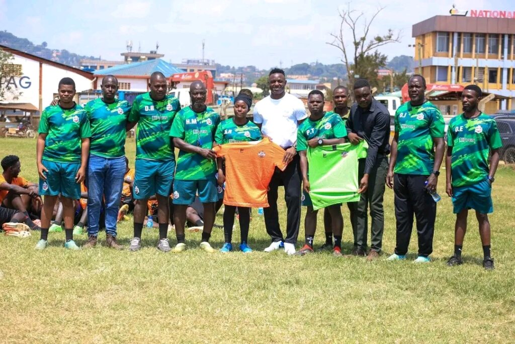 Victor Wanyama in a photo with some NEC players and staff
