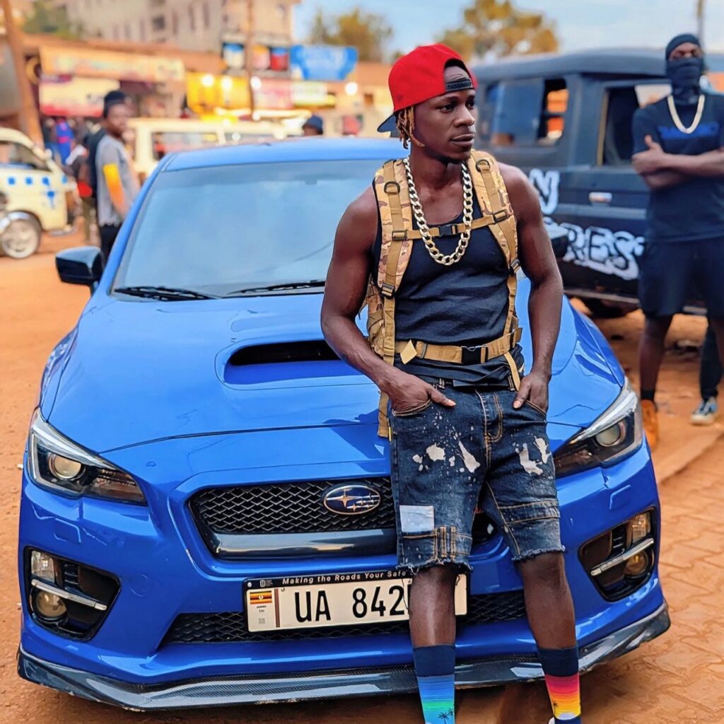 Alien Skin leaning against his car