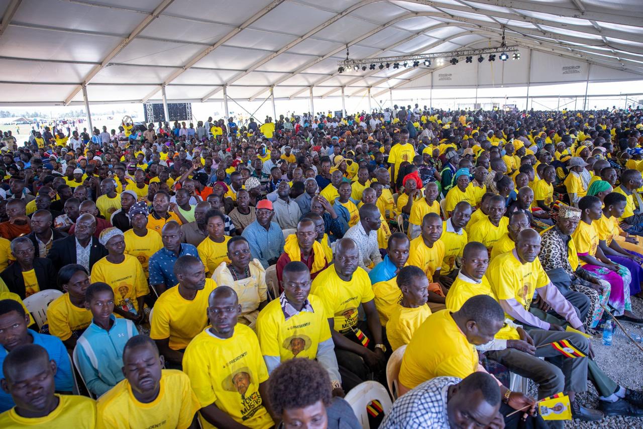 May be an image of one or more people, crowd and text