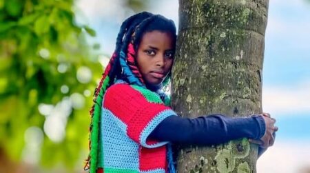 Kenyan Activist Truphena Muthoni Breaks 72-Hour Tree-Hugging World Record Kenyan Activist Truphena Muthoni Breaks 72-Hour Tree-Hugging World Record
